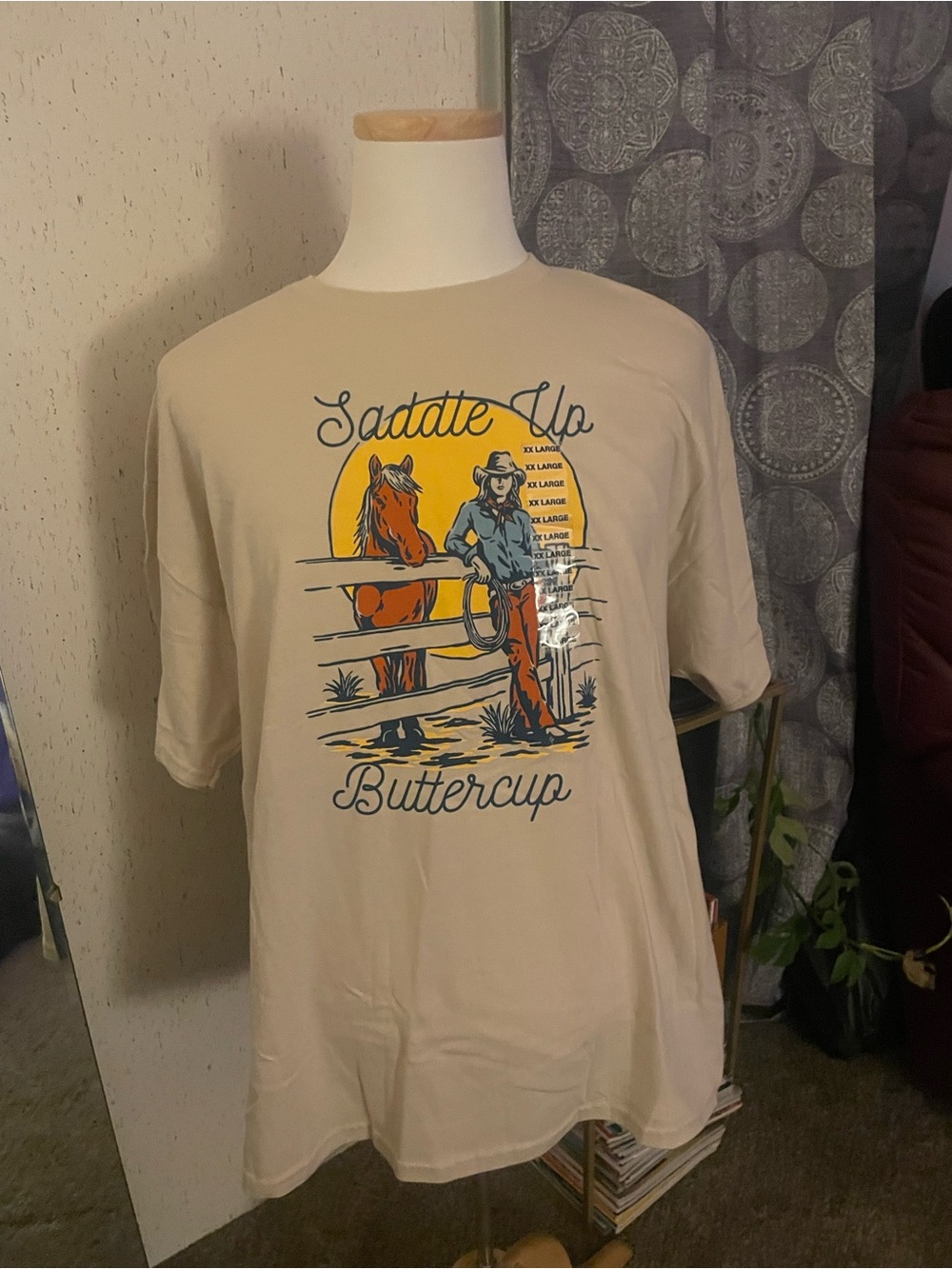 Gildan Beige "Saddle Up Buttercup" Graphic Tee with Yellow and Orange Print
